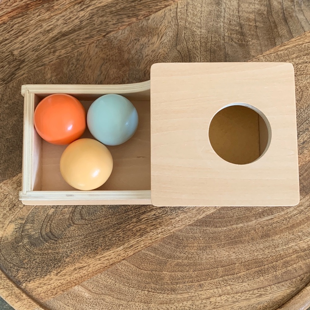 Wood object permanence toy